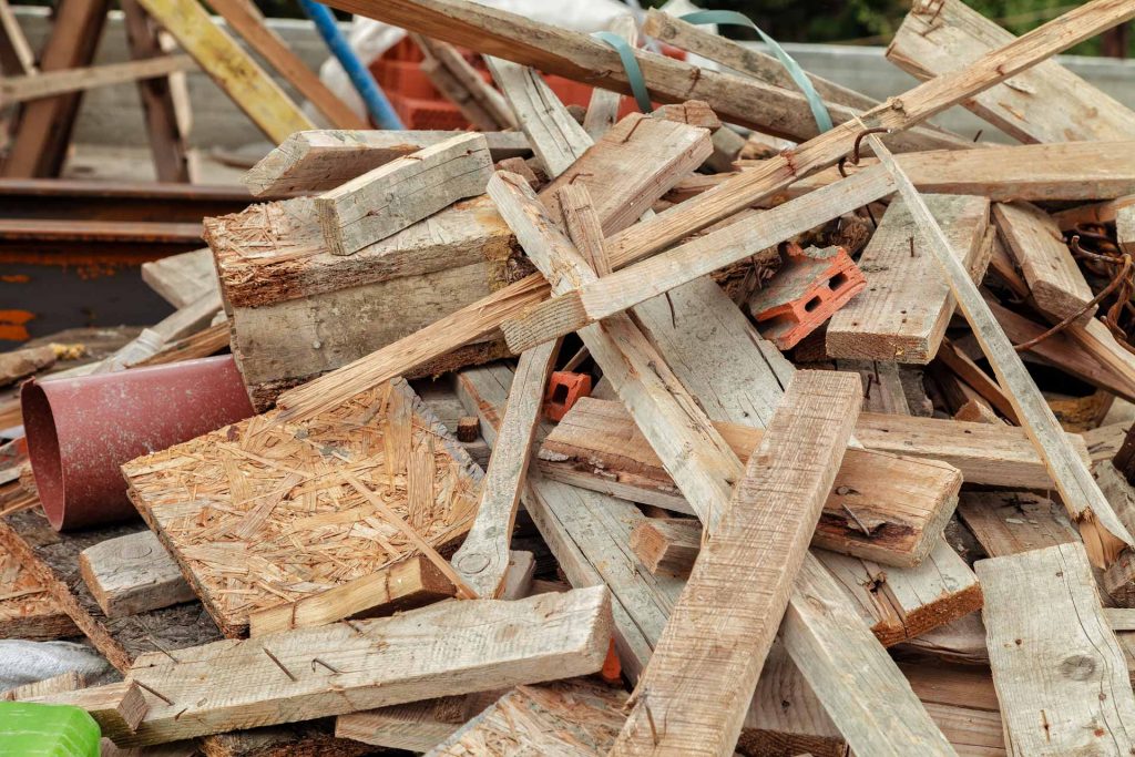 Pile of construction of lumber, bricks, and other construction waste