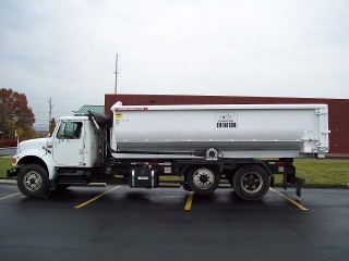 White dumpster truck