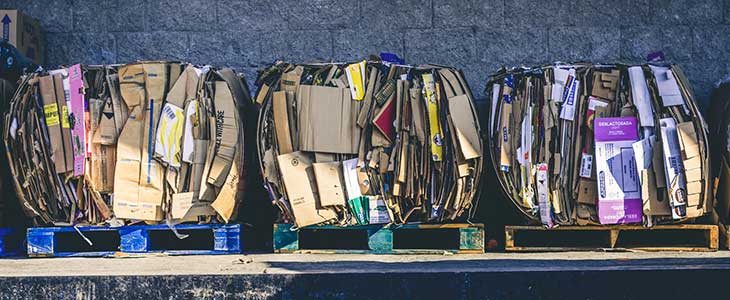 Dumpsters full of cardboard boxes